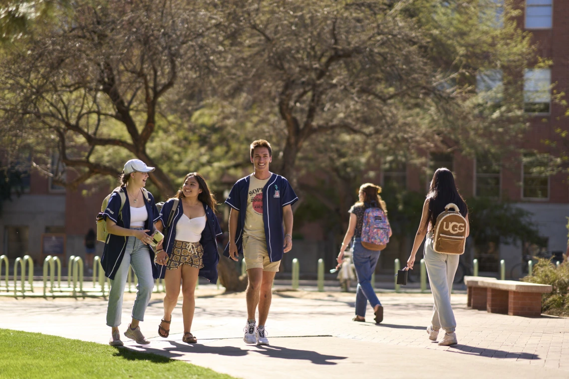 Students walking near Old Main